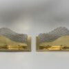 Bifacciali di cristallo; (Coppia) h 13,5 cm, larg. 24,5 cm, spess. 11 cm.