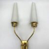 Doppie torce in lattimo con armature dorate; h 47 cm, larg. 24 cm, spess. 13,5 cm. copia
